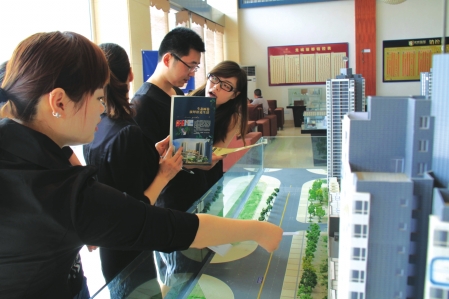 楼市新政初见效 泸州楼盘售价比标价低600元